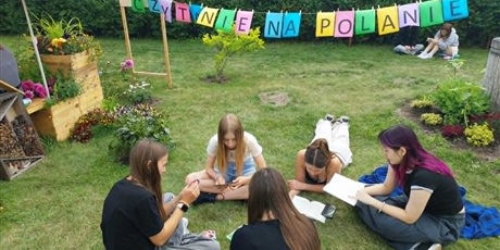 Powiększ grafikę: akcja-czytanie-na-polanie-2026r-703579.jpg